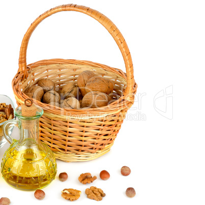 Oil of walnut and hazelnut, nut fruit isolated on white backgrou