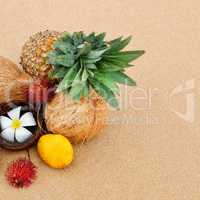 Set of tropical fruits on a sandy beach. Sri Lanka.