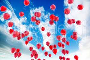 Red balloons and sky