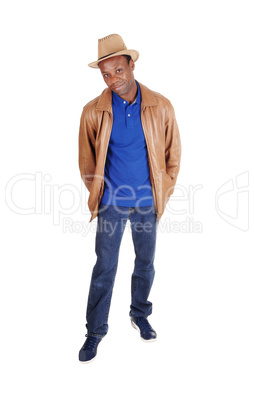 Handsome man in brown leather jacket and hat