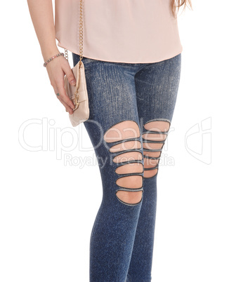 Close up of legs in jeans of woman