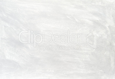 White washed painted textured abstract background with brush strokes in gray and black shades.