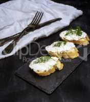 sandwiches with white cream cheese on a slice of bread