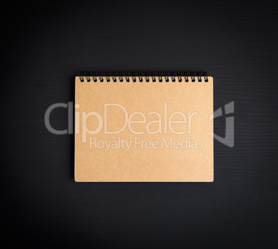 blank notepad with brown sheets