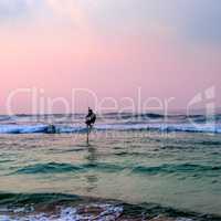 Traditional stilt fishermen in Sri Lanka.