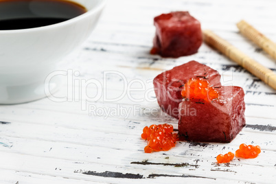 Red tuna sashimi with salmon roe.