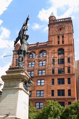 Maisonneuve monument and New York Life Building in Montreal, Can
