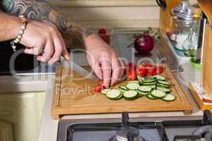 Whole farfalle pasta with zucchini, cherry tomatoes and red onio