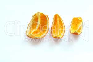 dried slices of orange, three slices of squeezed oranges, sliced of dried orange