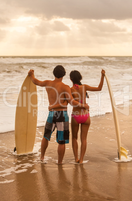 Asian Man Woman Couple Surfboards on Beach