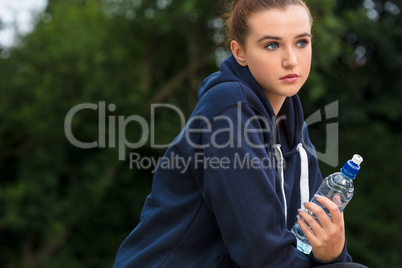 Sad Teenager Young Woman Drinking Bottle of Water