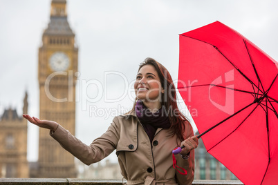 Woman With Umbrella by Big Ben, London, England