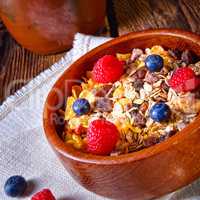 rustic muesli breakfast with forest fruits