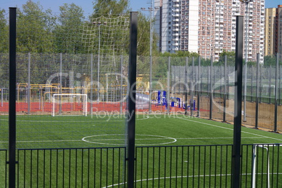 football field near fence at day sunny day