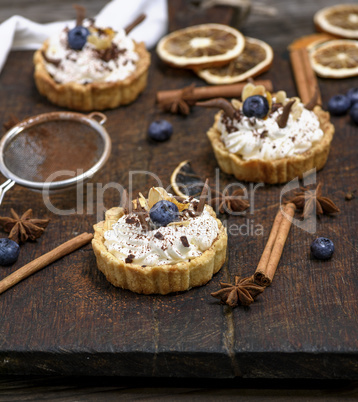 sweet cakes with white cream