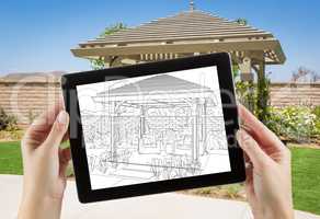 Female Hands Holding Computer Tablet with Drawing of Pergola on