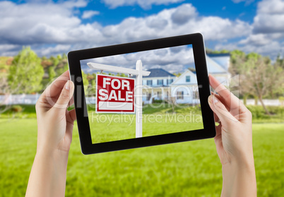 Female Hands Holding Computer Tablet with Home For Sale Sign on