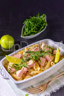 Salmon with penne noodle and arugula