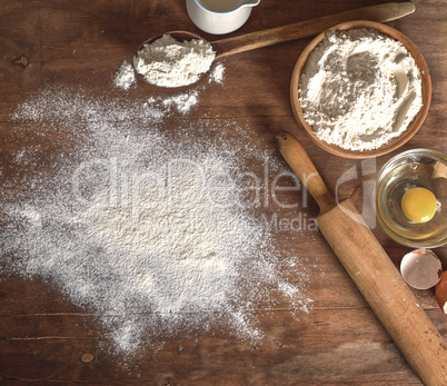 white wheat flour in a wooden bowl