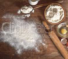 white wheat flour in a wooden bowl