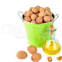 Oil of walnut and nut fruit isolated on white background. Free s