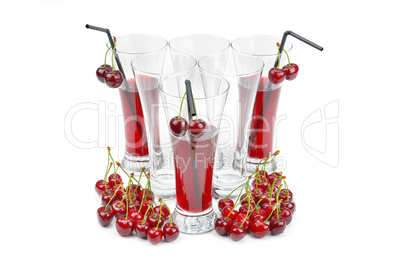 Cherry and glass of juice isolated on white background.