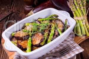 Eggplant casserole with green asparagus