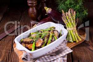 Eggplant casserole with green asparagus