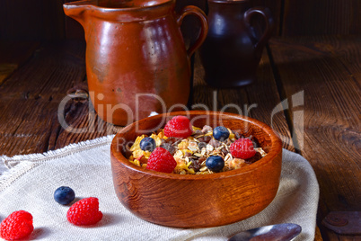 rustic muesli breakfast with forest fruits