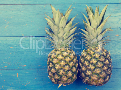 Sweet organic pineapple on blue wood