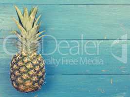 Sweet organic pineapple on blue wood