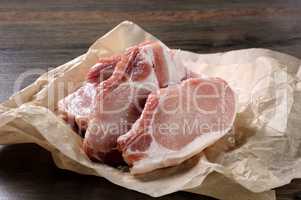 Raw pork steaks on bone