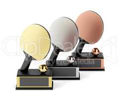 Table tennis trophies on white background