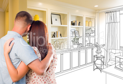 Young Military Couple Facing Custom Built-in Shelves and Cabinet
