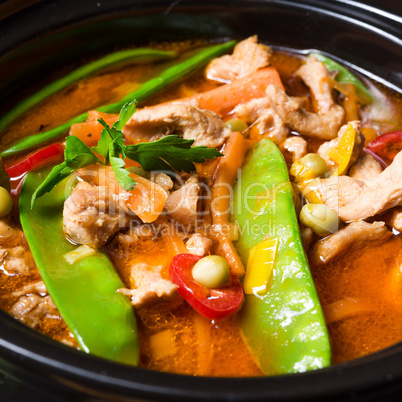 strips of pork  with sugar peas and other vegetables