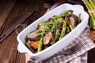 Eggplant casserole with green asparagus