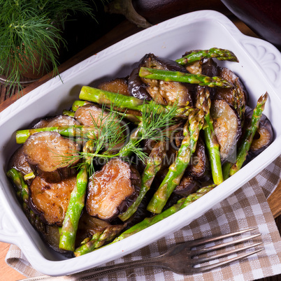 Eggplant casserole with green asparagus