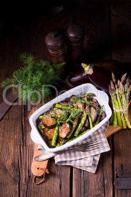 Eggplant casserole with green asparagus