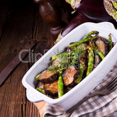 Eggplant casserole with green asparagus