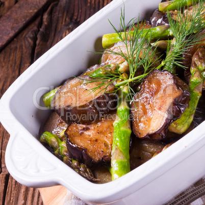 Eggplant casserole with green asparagus