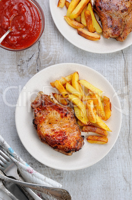 pork steak on dice with potatoes