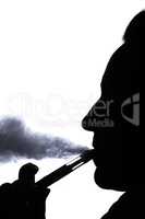 Silhouette of a woman with an electronic cigarette