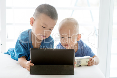 Children addicted to tablet.
