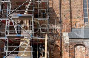 scaffolding with church spire