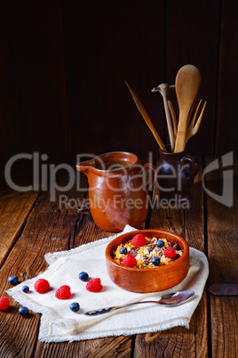 rustic muesli breakfast with forest fruits