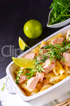 Salmon with penne noodle and arugula