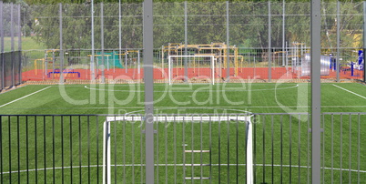 football field near fence at day sunny day