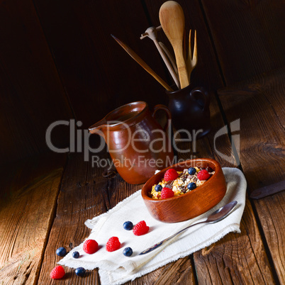 rustic muesli breakfast with forest fruits