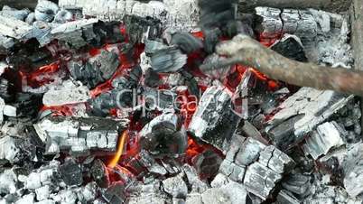Breaking hot burnt sparkling charcoal