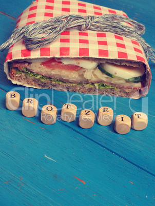 Tasty sandwich on a blue table